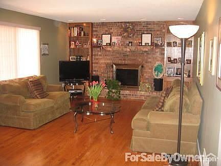 Family Room w/ Fireplace/ Sliding Doors