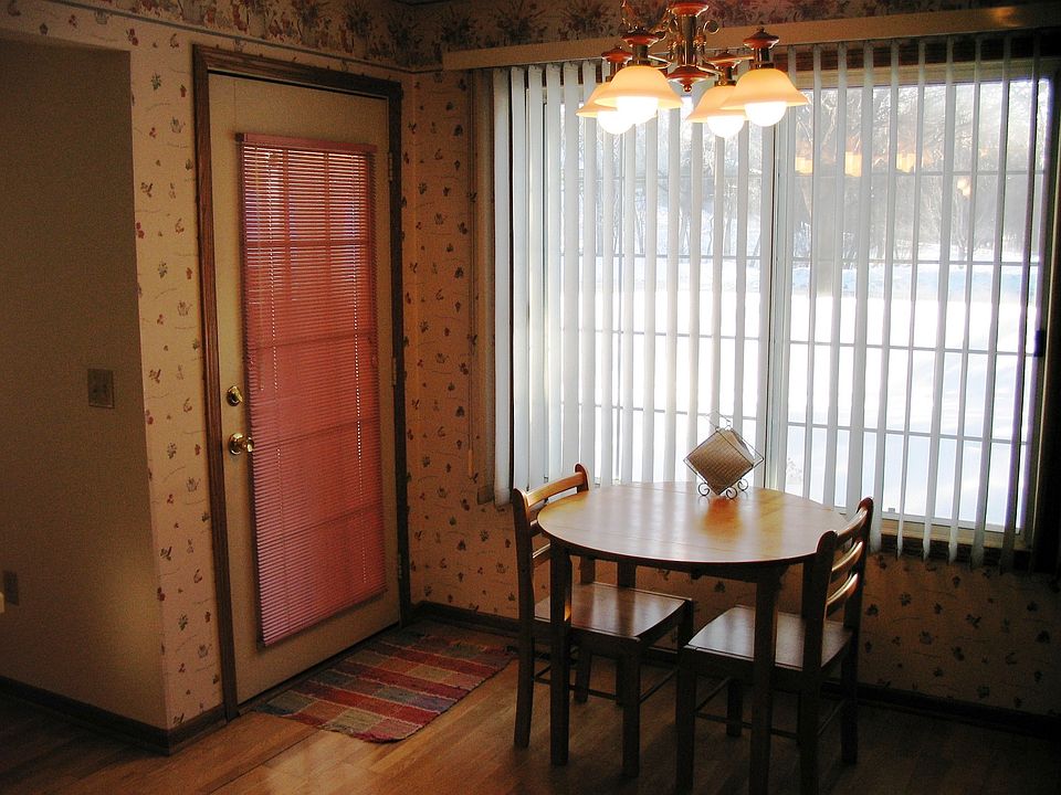 Eat in kitchen with entrance to 3 season porch