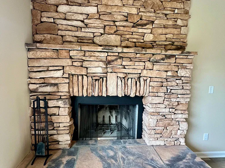 Custom rock wood-burning fire place