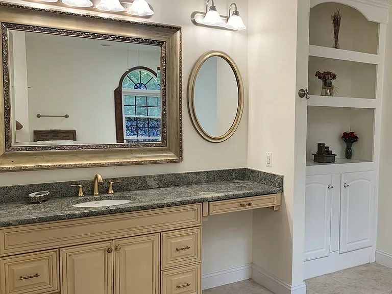 Luxury Primary Bath with gold finsh faucet