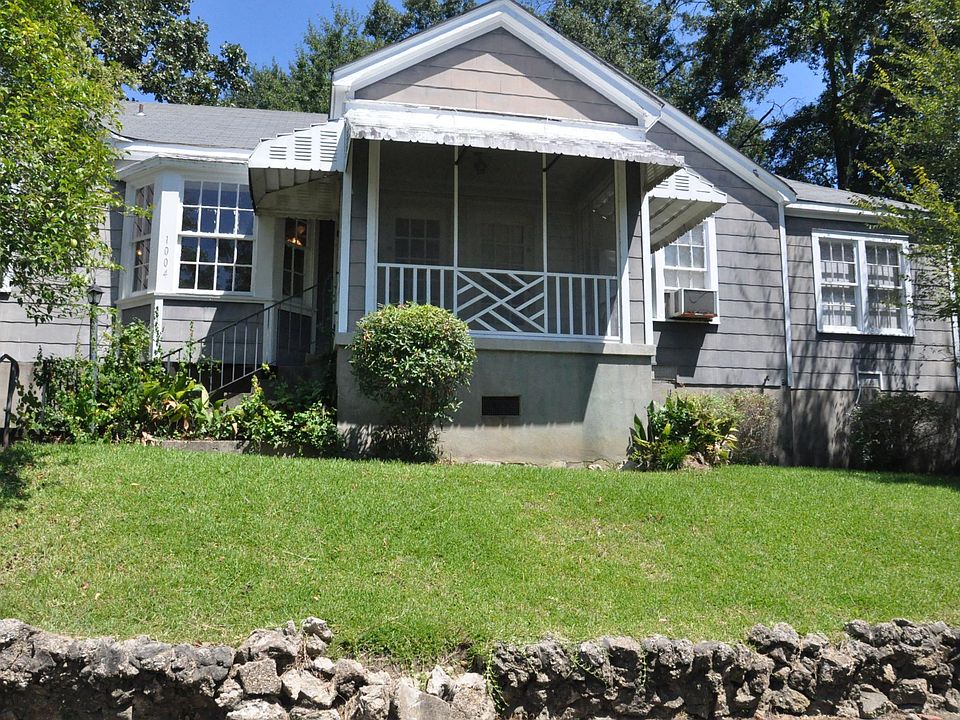 Front entry through private screened in porch.