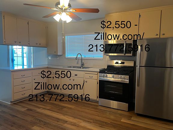 New quartz countertops and new sink. New appliances; stove, microwave and refrigerator