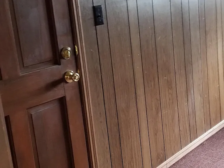 Garage Room with exterior side entrance door.