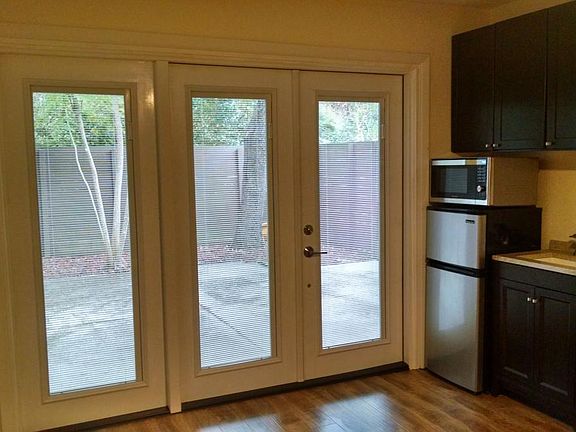 new French doors with blinds