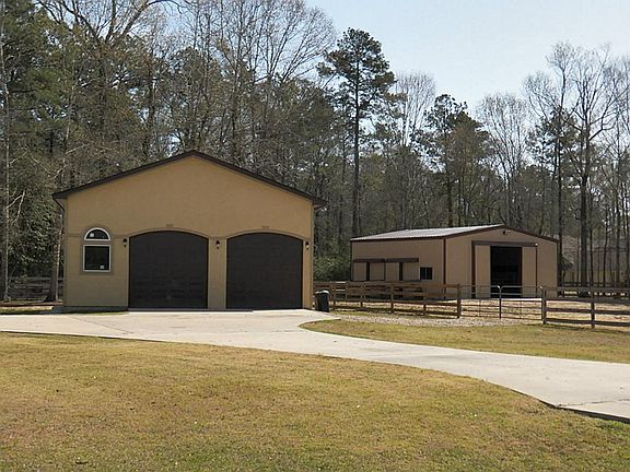Garage has been framed inside for storage and/or possible bathroom. 220 as well