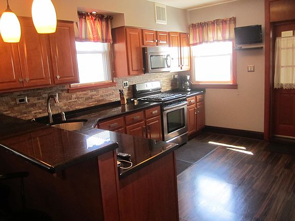 5th image of 6131 W Newport Ave