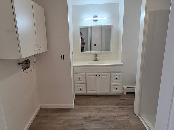 Bathroom 1 - Large, with laundry hookup and walk-in shower