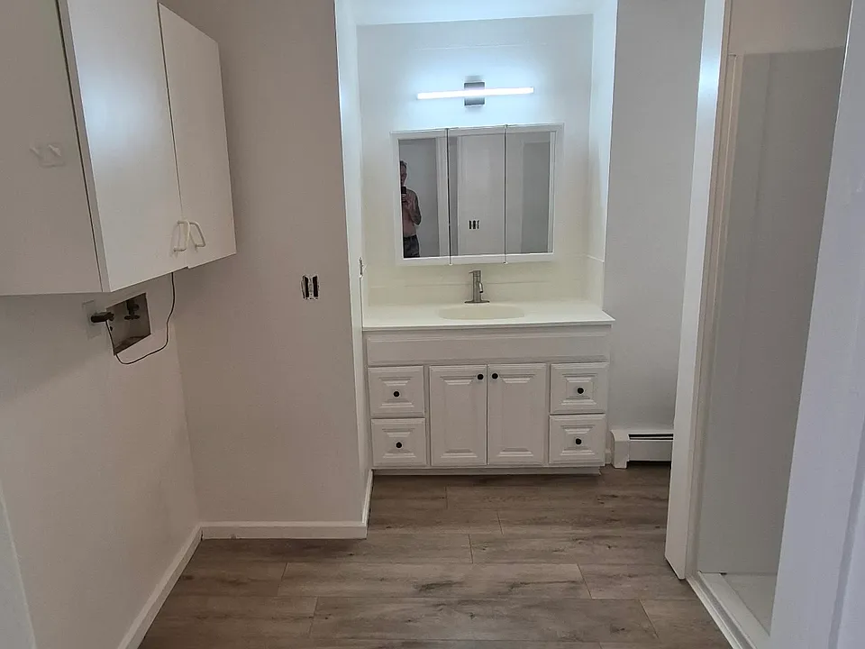 Bathroom 1 - Large, with laundry hookup and walk-in shower
