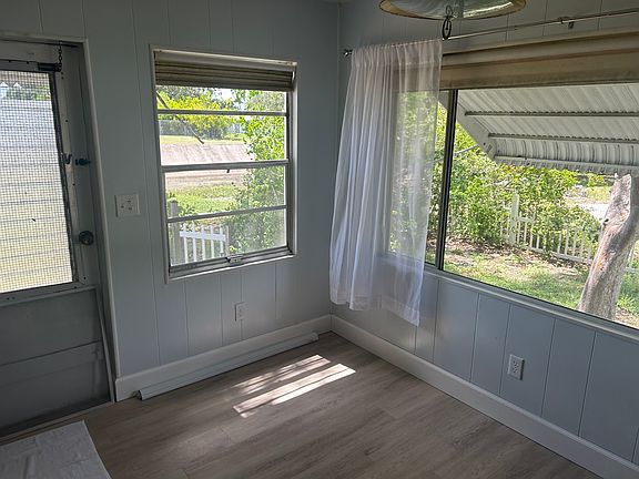 Dining room - new door with window has replaced the one shown.