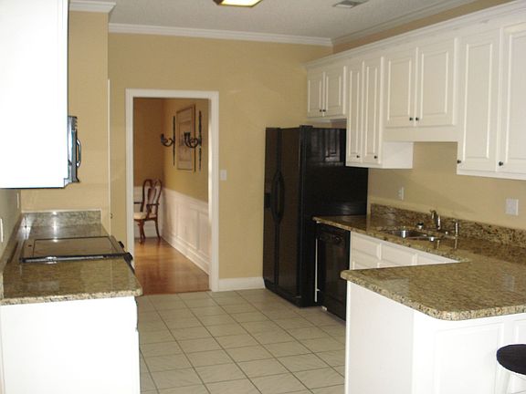 Kitchen with new granite and faucet