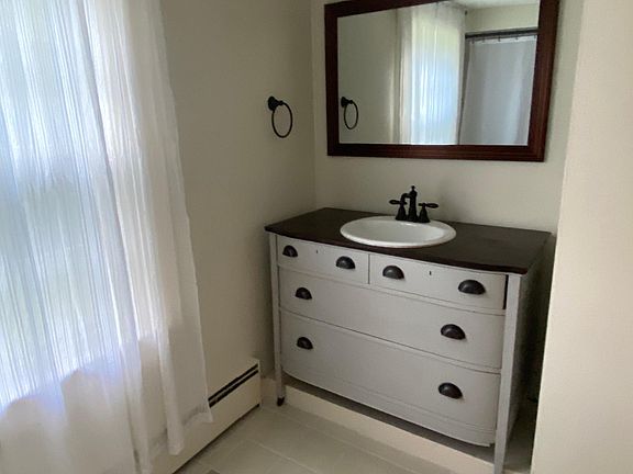 Large bathroom with tub and shower