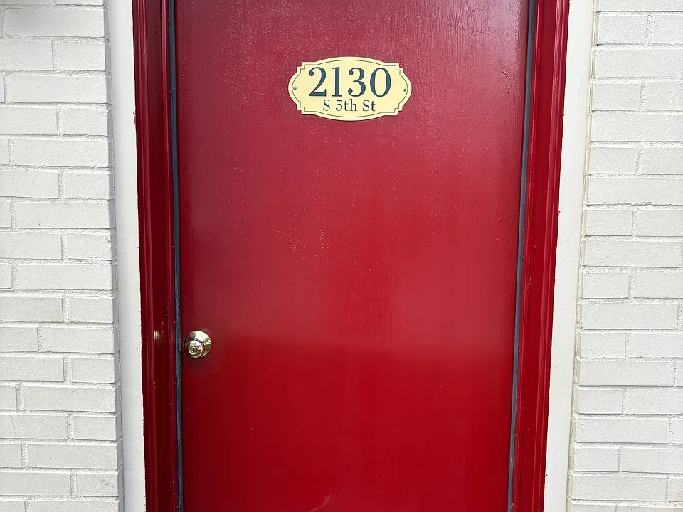 2130 S 5th St. has beautiful steel entry doors on the front AND side of this well kept and secure corner property.