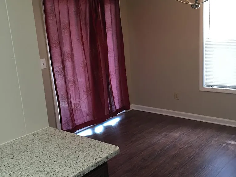 dining room has a sliding glass door that leads out to patio