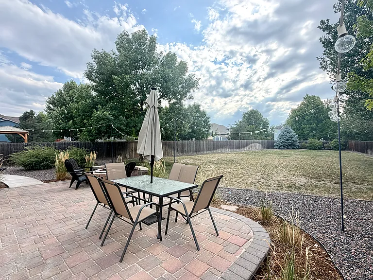 Step outside and enjoy the expansive backyard. With a spacious patio and inviting fire pit, this outdoor space is made for summer evenings, weekend gatherings, and relaxing under the stars. Plenty of room to enjoy the outdoors and make it your own.