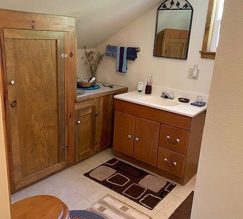 Bathroom has large storage closet