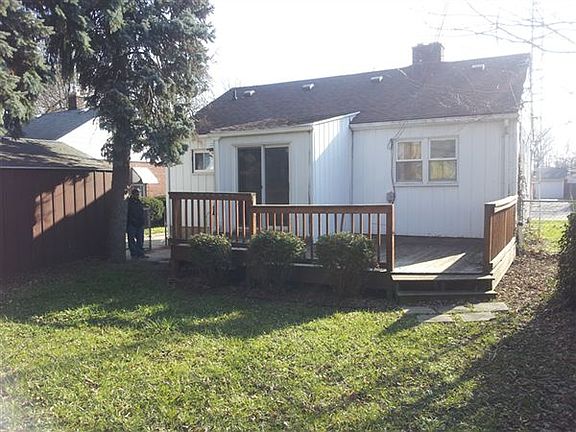 deck in fenced backyard