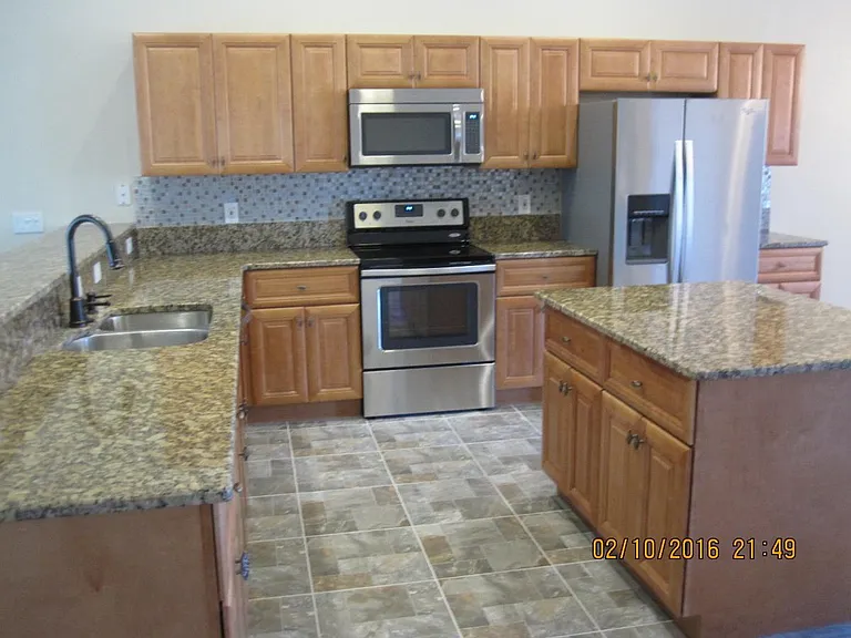 Great Back Splash & New Stainless Steel Appliances