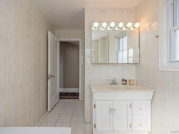 Second floor large bath with tub updated. Perfect for evening baths for kids BATHTUB New vanity and makeup mirror