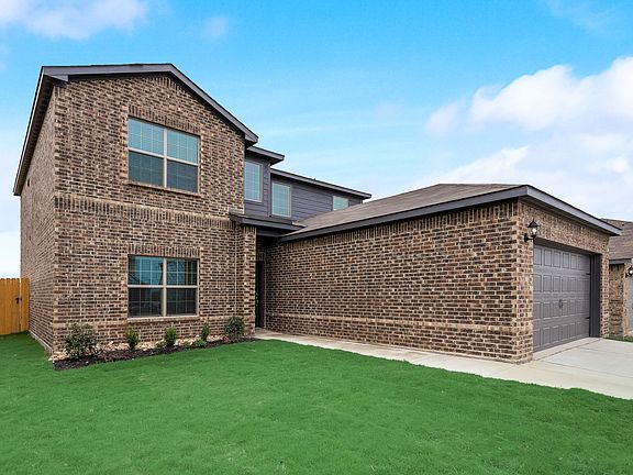 Enjoy the stately curb appeal of this beautiful home.