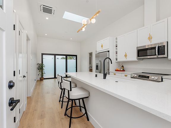 Kitchen and open living area.