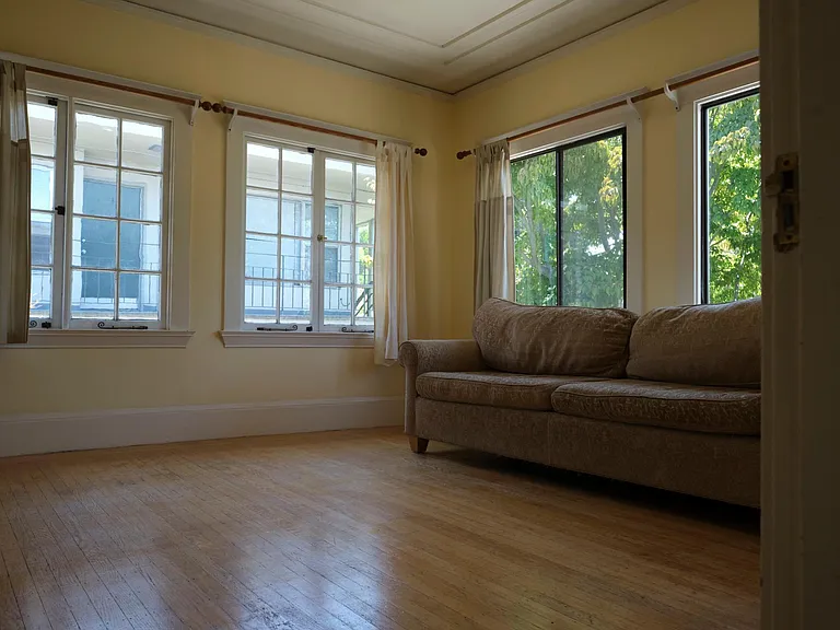 Living room hardwood floor, and view.