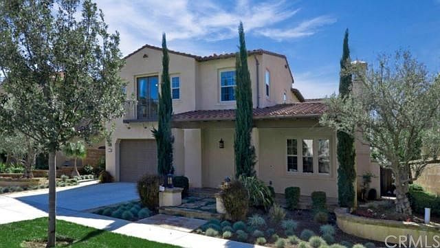 Stately Architecture and Exquisite Landscaping with Stone Walkways and Front Porch