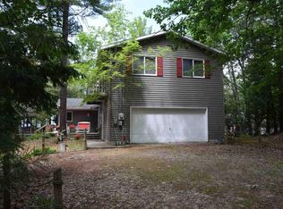 4706 Juniper Dr, Kewadin, MI 49648