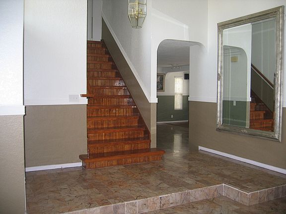 Grand foyer with marble flooring
