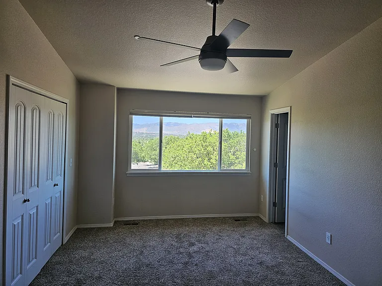 master bedroom with large closet with built-ins and ensuite bathroom.
Check out that westerly view!