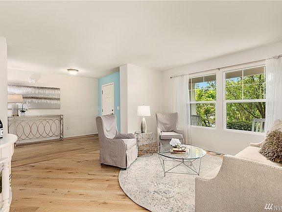 An abundance of windows allow natural light to flood in.