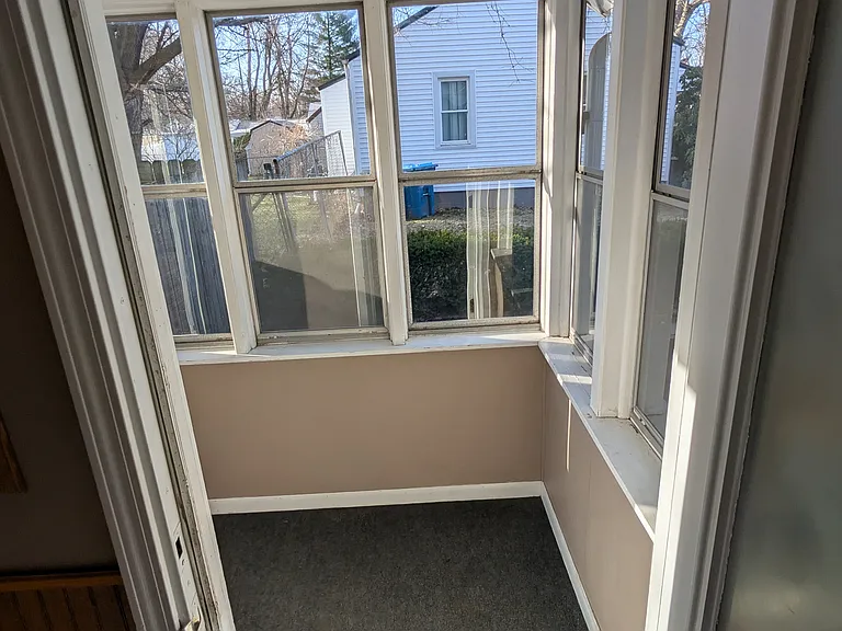 looking out of kitchen to side porch