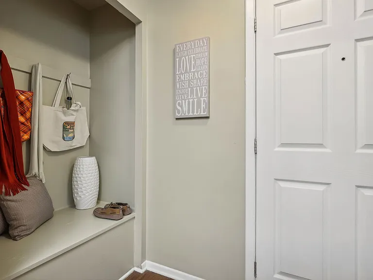 Stay organized with a convenient entryway bench and storage at University Oaks Apartments near Kent State University.