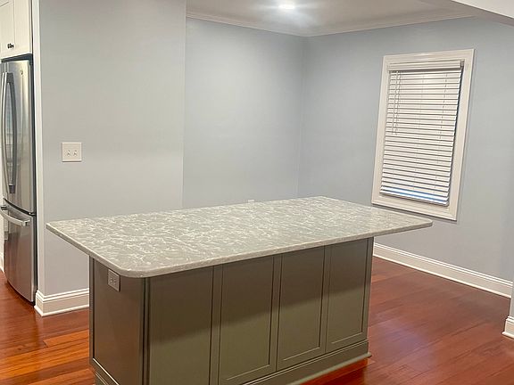 Large work island will accommodate 6 counter height stools.