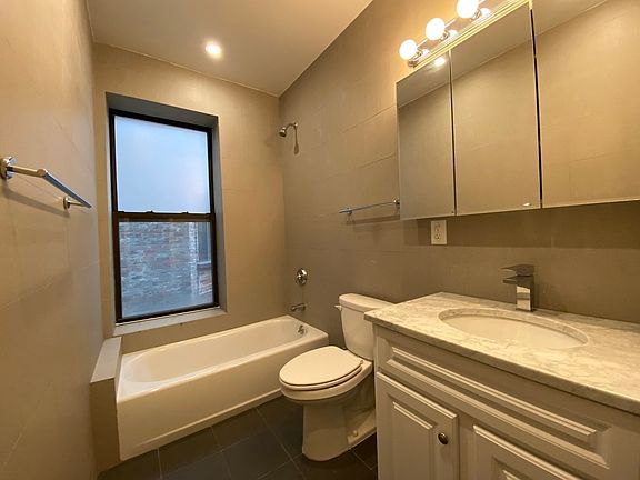 5th image of 332 E 18th St APT 19
