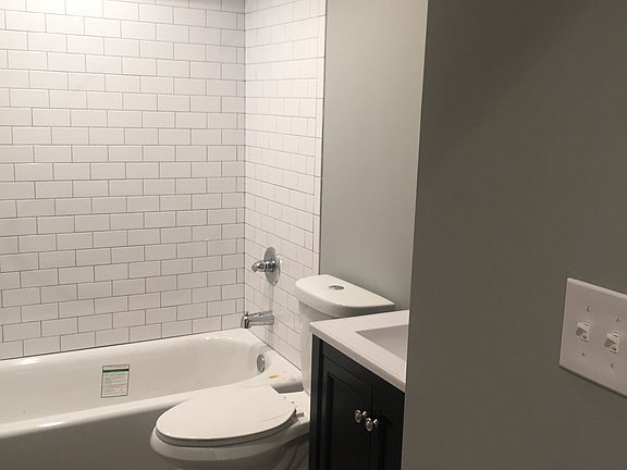 Modern bathroom with new fixtures & plumbing