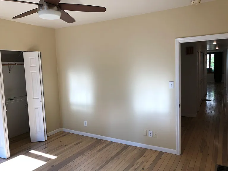 Bedroom (has wall of closets)