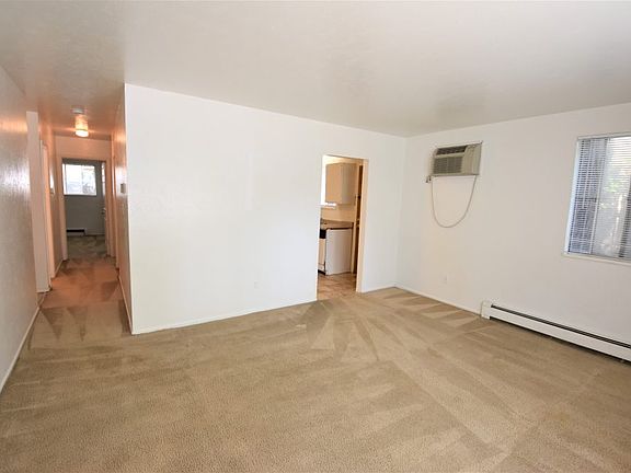 Living Room with hallway to bedrooms