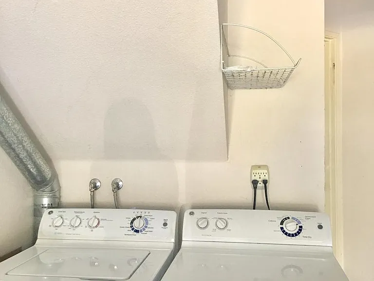 Washer and drier in the garage