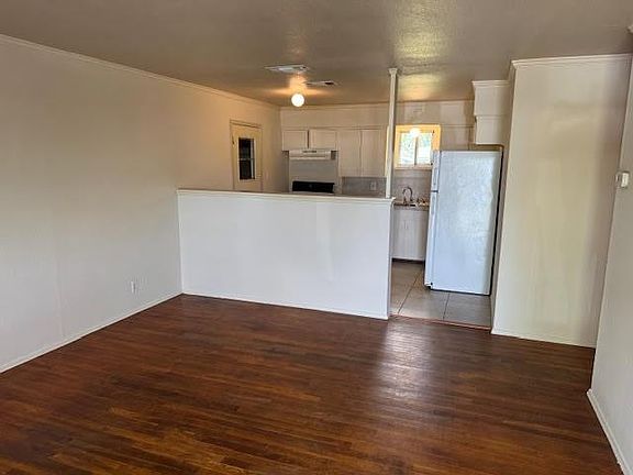 ANOTHER VIEW OF THE LIVING ROOM