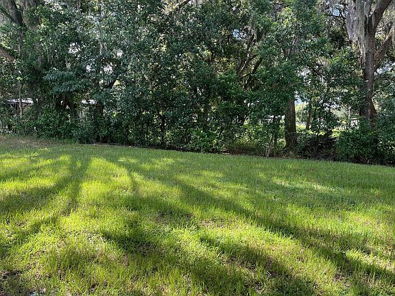 Sweetwater new construction quick move-in home plan 34826 Mulrion Dr. backyard Lanier Acres in Zephy