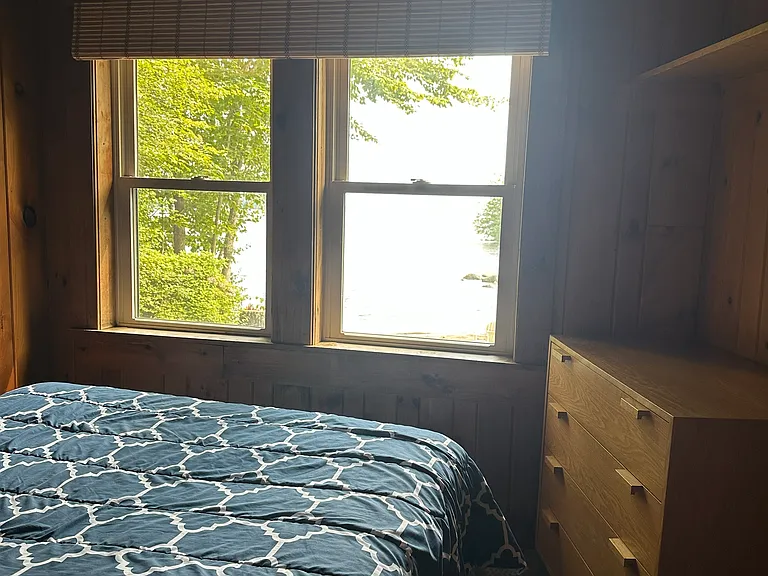 Front Bedroom. The glare in the windows is actually the lake.