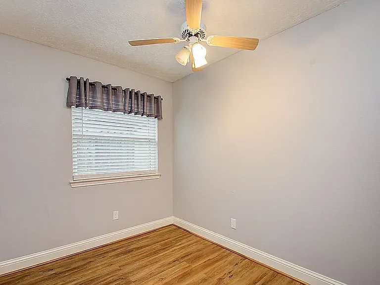 Comfortable secondary bedroom ideal for family or guests.