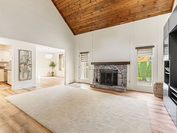 Living Room w/fireplace and Entertainment System 
Beautiful wood vaulted ceilings