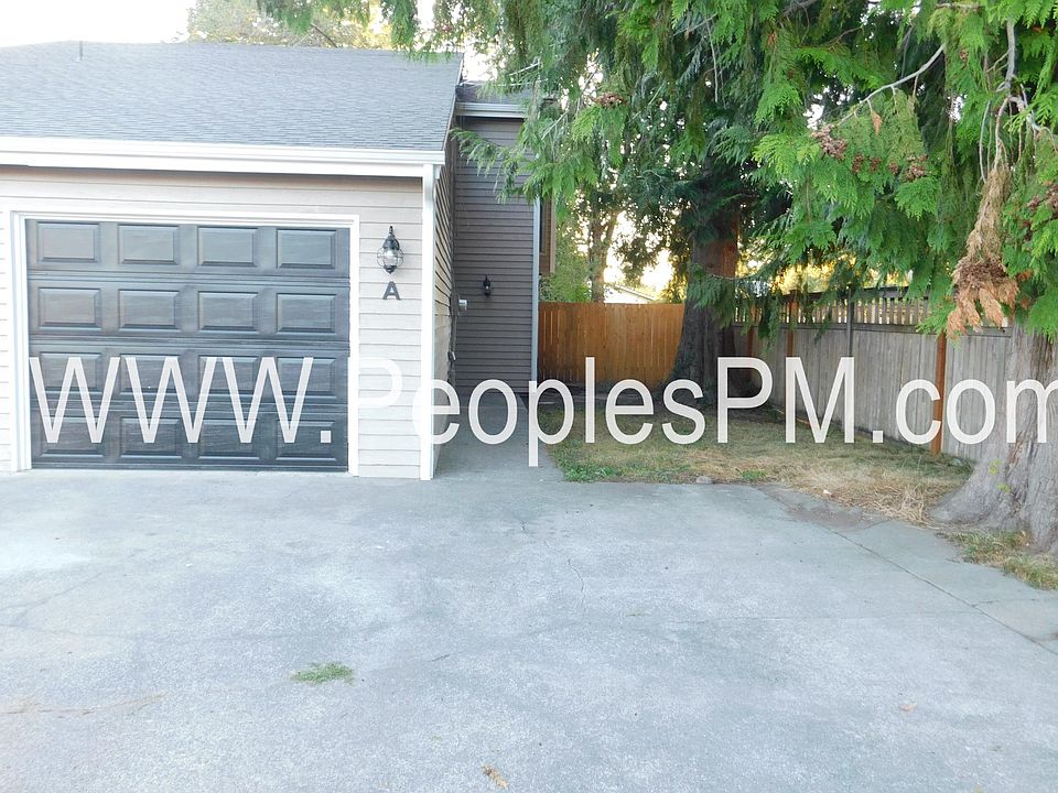 Front with 2 car garage