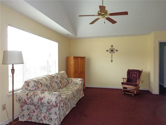 Living Area Has Cathedral Ceiling.