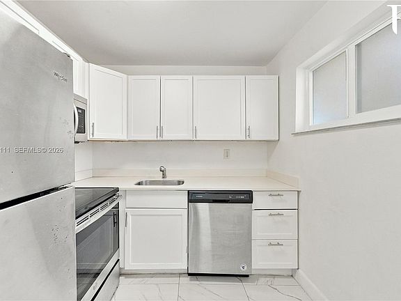 5th image of 6965 Harding Ave APT 406