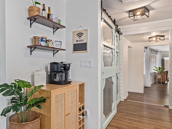 Coffee/tea nook nestled into corner of the kitchen with a Keurig duo coffeemaker
