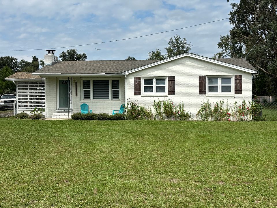 3 Bedroom 2 baths includes an Alert tech alarm system central heating and air, a very nice breezy porch to watch beautiful Sunsets. The home has a fenced in yard plus a 16x20 storage shed and a 20x20 covered shelter to keep a boat ATV or lawnmower etc.