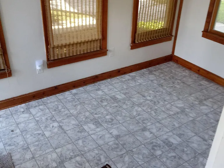 The 3-Season Room (formally a front porch). NICE place to sit and/or watch TV in the summertime!