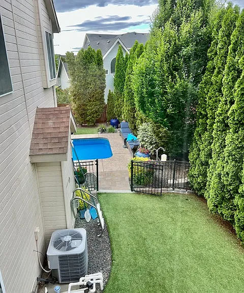 A look at the backyard from one of the upstairs bedrooms.